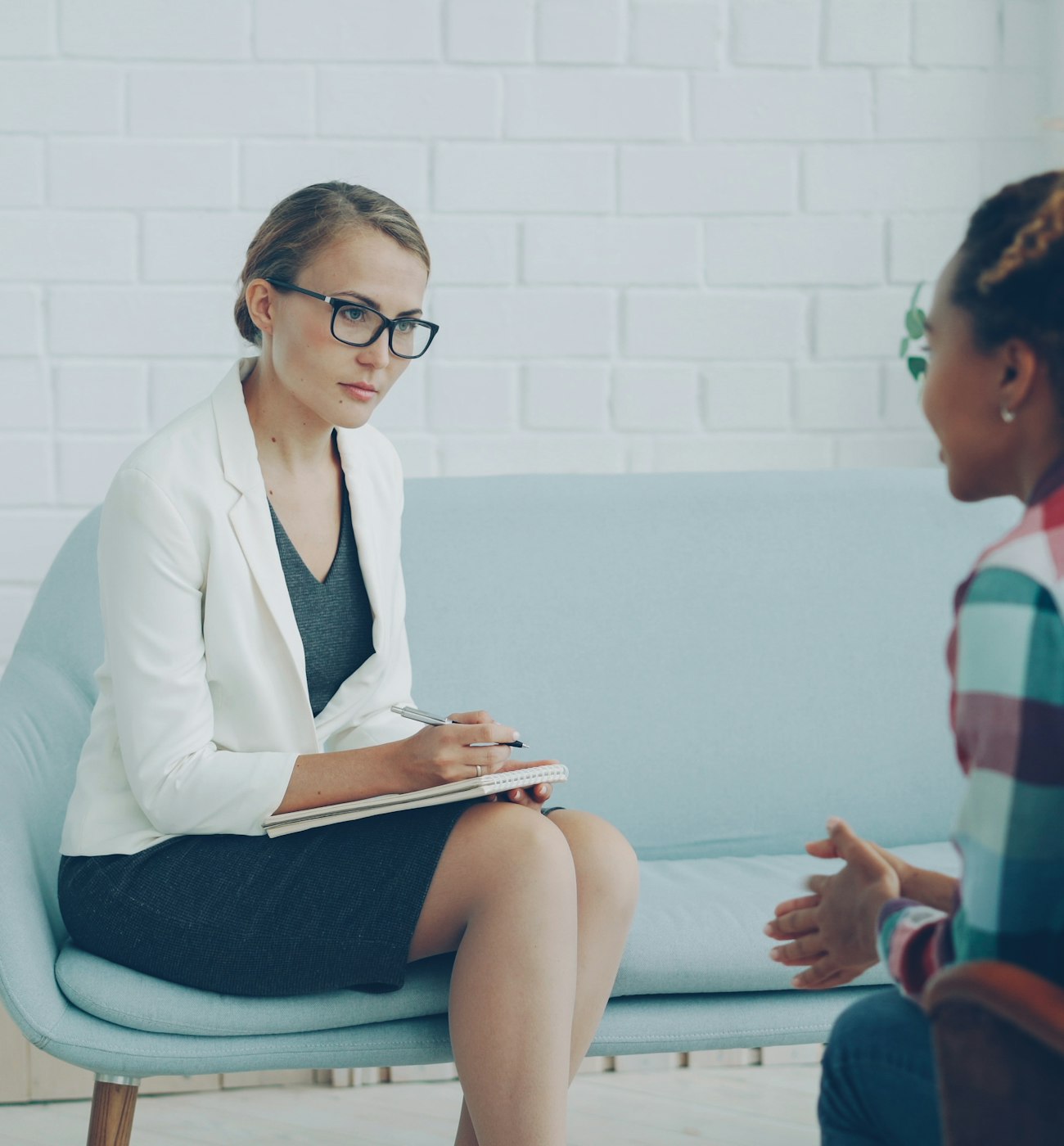 Researcher conducting a one-on-one interview for TIER research and evaluation services